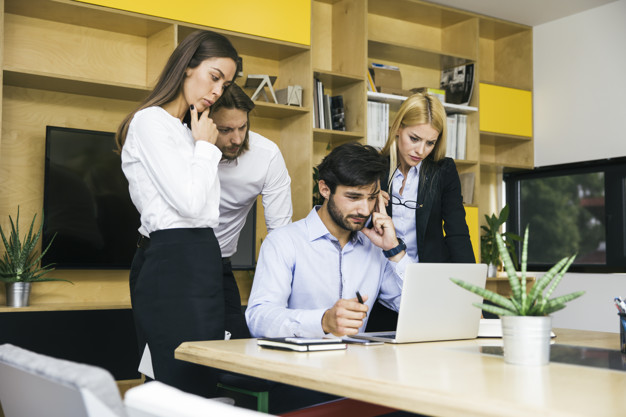 young-business-people-working-office_52137-24572.jpg